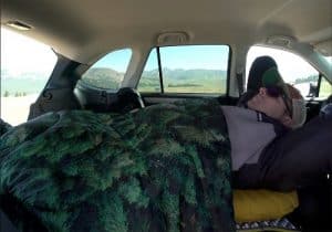 Man sleeping in the backseat